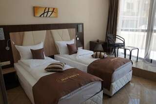 Отель Hotel Infinity & Spa Park Velingrad Велинград Двухместный номер эконом-класса с 2 отдельными кроватями - Первый этаж-1